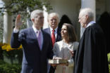 Neil Gorsuch is sworn in at the White House rose garden. Image of Neil Gorsuch is sworn in at the White House rose garden.