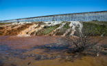 On February 11, 2017, water topped the Oroville spillway as the dam threatened to give way under the immense pressure of a full reservoir and eroding rainfall. Image of On February 11, 2017, water topped the Oroville spillway as the dam threatened to give way under the immense pressure of a full reservoir and eroding rainfall.
