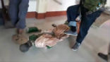 Terrorists stomp and shatter a statue of a saint while ransacking a Catholic church in Mindanao. Image of Terrorists stomp and shatter a statue of a saint while ransacking a Catholic church in Mindanao.