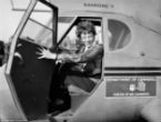 A new photograph appears to show Earhart and Noonan awaiting transport on a ship towing their wrecked plane. Image of A new photograph appears to show Earhart and Noonan awaiting transport on a ship towing their wrecked plane.