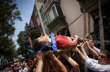 Rescuers move an injured man to safety. Over 800 people were seriously injured. Minor injuries were widespread. Image of Rescuers move an injured man to safety. Over 800 people were seriously injured. Minor injuries were widespread.