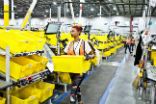 Amazon workers are being replaced by robots, but they aren't being laid off either. The growth of online retail means they can fill other roles, as the workload increases. Image of Amazon workers are being replaced by robots, but they aren't being laid off either. The growth of online retail means they can fill other roles, as the workload increases.