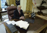 President Trump signed the tax cut bill early as a Christmas present for the American people. Image of President Trump signed the tax cut bill early as a Christmas present for the American people.