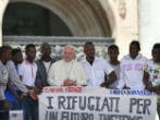 Pope Francis with refugees. Image of Pope Francis with refugees.