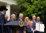 Priests for Life's Alveda King, second from left, watches as President Trump signs an executive order on religious liberty in May 2017. Image of Priests for Life's Alveda King, second from left, watches as President Trump signs an executive order on religious liberty in May 2017.