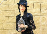 Nasim Aghdam had a bizarre YouTube account where she posted images of herself with animals. She accused YouTube of censoring her videos and reducing viewership and advertising payments for her content. Image of Nasim Aghdam had a bizarre YouTube account where she posted images of herself with animals. She accused YouTube of censoring her videos and reducing viewership and advertising payments for her content.