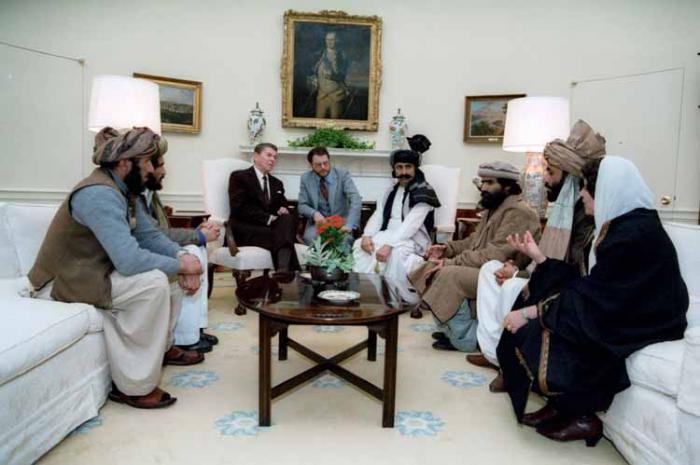 President Reagan meets with Mujaheddin fighters in 1985. Al Qaeda was spawned from this alliance. President Reagan meets with Mujaheddin fighters in 1985. Al Qaeda was spawned from this alliance.