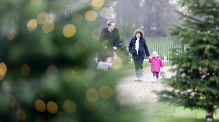 Family walking down the road during the Winter