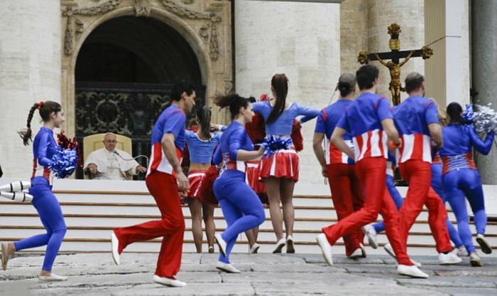 The troupe performed cheers, acrobatics and juggling. The troupe performed cheers, acrobatics and juggling.