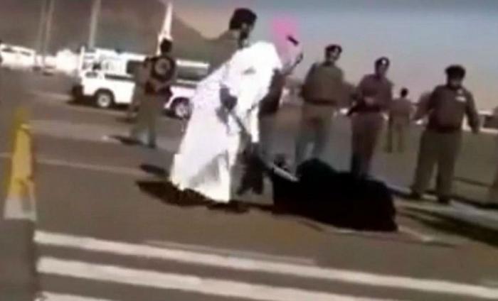 Woman beheaded in the street. Woman beheaded in the street.