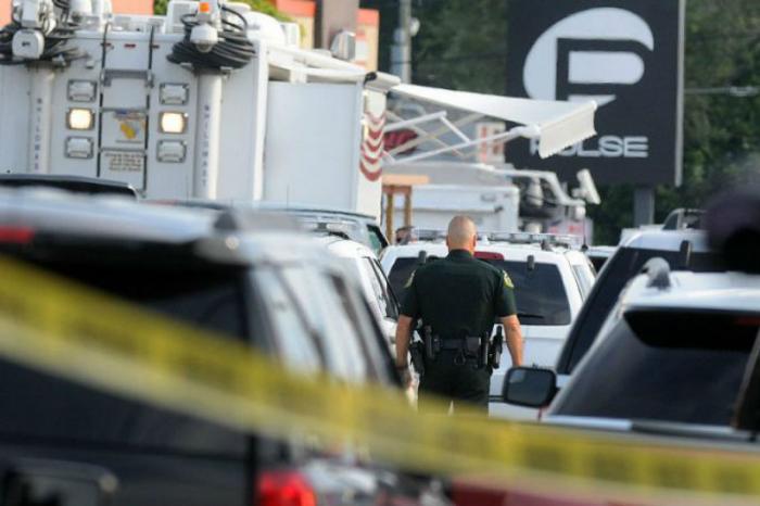 Orlando police officers seen outside of Pulse nightclub after a fatal shooting and hostage situation. Orlando police officers seen outside of Pulse nightclub after a fatal shooting and hostage situation.