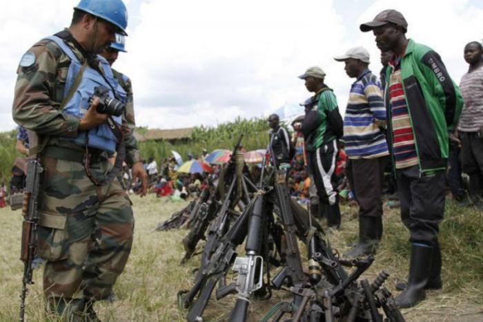 UN peacekeepers recover weapons from militants in Congo. UN peacekeepers recover weapons from militants in Congo.