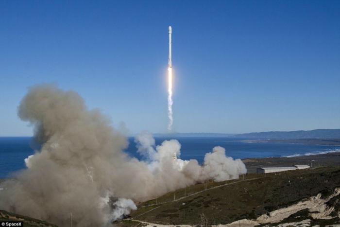 Two-stage rocket lifting from Vandenberg Air Force Base, CA.