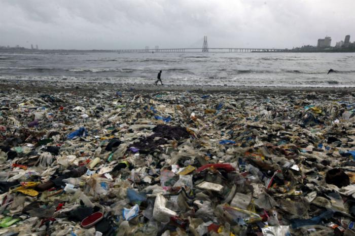 Trash piles on shores, then gets washed out to sea. This is a common method of contamination. Plastic is accumulating at the rate of one garbage truck per minute.