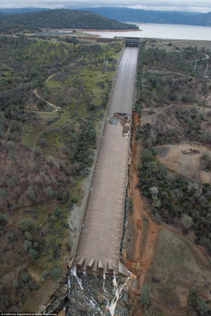 The spillway was damaged by erosion last week. The spillway was damaged by erosion last week.