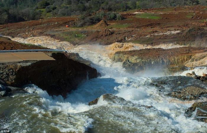 A close up of the damage caused by the erosion in front of the emergency spillway. If more water crests the spillway, the dam could fail entirely. 