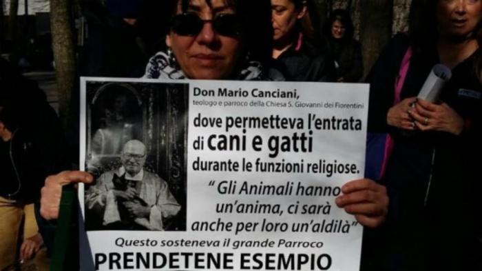 Protesters demand pets receive the same rights as Christians. Protesters demand pets receive the same rights as Christians.