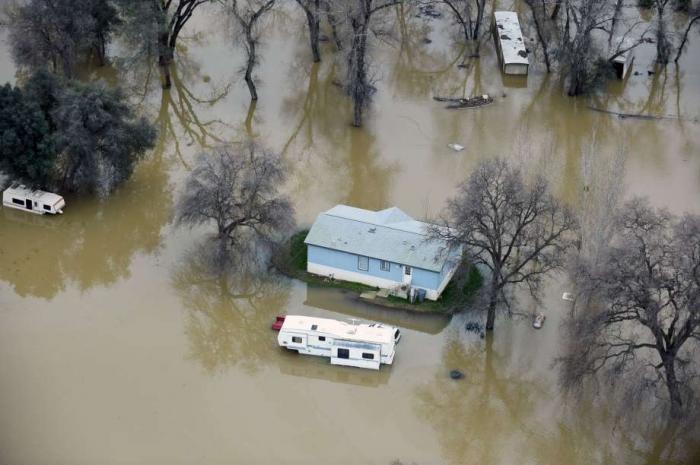 Homes are inundated even far away from the Oroville dam. Homes are inundated even far away from the Oroville dam.