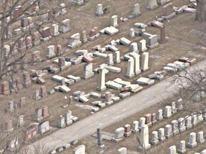 Dozens of headstones overturned at Chesed Shel Emeth Cemetery.