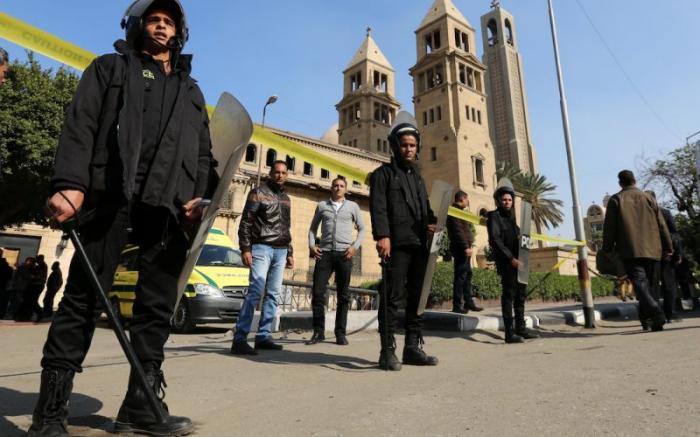 Members of the special police forces stand guard to secure the area around the Coptic Orthodox cathedral, in Cairo, complex after a bombing in December.