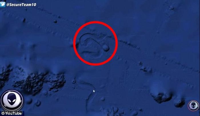 Could it be aliens? You can check out the object for yourself by going to the coordinates 49Â°59'06.2'N 140Â°03'16.6'W on Google Earth. 