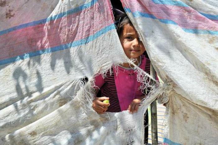 Syrian refugee girl. Syrian refugee girl.