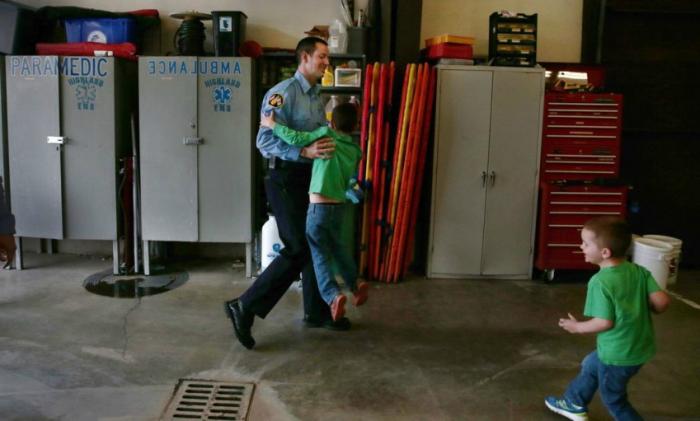 Todd Zobrist greets his sons. Todd Zobrist greets his sons.