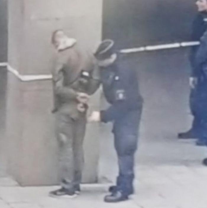 Police were seen arresting a suspect near the site of the attack. It is unknown if this person is the terrorist. Police were seen arresting a suspect near the site of the attack. It is unknown if this person is the terrorist.