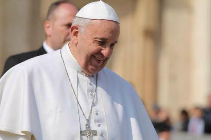 Pope Francis greets pilgrims during his March 11, 2015 general audience in St. Peter's Square. Pope Francis greets pilgrims during his March 11, 2015 general audience in St. Peter's Square.