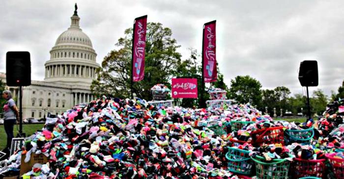 Nearly 200,000 socks were piled onto the U.S. Capitol's lawn. Nearly 200,000 socks were piled onto the U.S. Capitol's lawn.