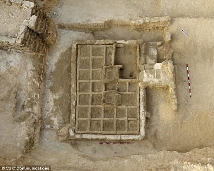 The garden is laid out in a grid with plants and shrubs planted to sustain the deceased in the afterlife.