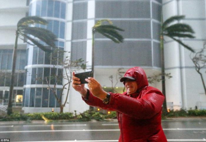I know I should be in a safe place, but first let me take a selfie. Many Florida residents took risks during the storm, driving, taking photos, and engaging in various antics. Foolhardy behavior resulted in at least a few fatalities across the state. I know I should be in a safe place, but first let me take a selfie. Many Florida residents took risks during the storm, driving, taking photos, and engaging in various antics. Foolhardy behavior resulted in at least a few fatalities across the state.