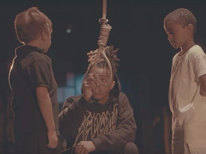 Rapper XXXTentacion lynches a child in his video. 