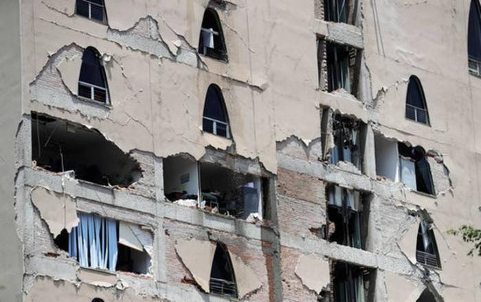 One building suffered dramatic damage, losing sections of wall during the quake. One building suffered dramatic damage, losing sections of wall during the quake.