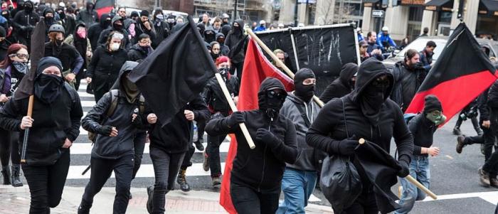 ANTIFA runs riot during a protest. The foot soldiers remain anonymous and have one aim, which is violence. 