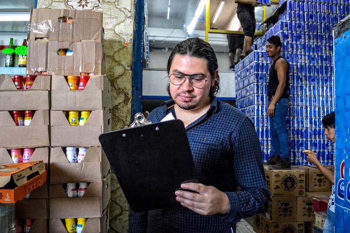 Daniel Alberto Paniagua Flores, 29, who studied audiovisual communication, manages the finances of his familyâ⬠s grocery store in Mexico City, Mexico. He says he had trouble finding work related to his major because of his expectations for pay and time commitment. Daniel Alberto Paniagua Flores, 29, who studied audiovisual communication, manages the finances of his familyâ⬠s grocery store in Mexico City, Mexico. He says he had trouble finding work related to his major because of his expectations for pay and time commitment.