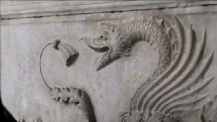 The tomb is covered in carvings including a dragon (pictured) which the expert says means Dracula, w The tomb is covered in carvings including a dragon (pictured) which the expert says means Dracula, w