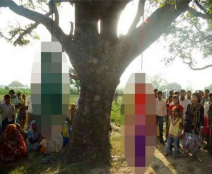 In May, two teenage cousins were found hanging from a tree, pictured, after being raped in the north In May, two teenage cousins were found hanging from a tree, pictured, after being raped in the north