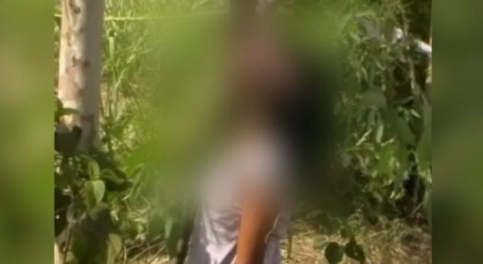 Earlier this month, a separate video emerged showing another alleged rape victim, 19, hanging from a Earlier this month, a separate video emerged showing another alleged rape victim, 19, hanging from a