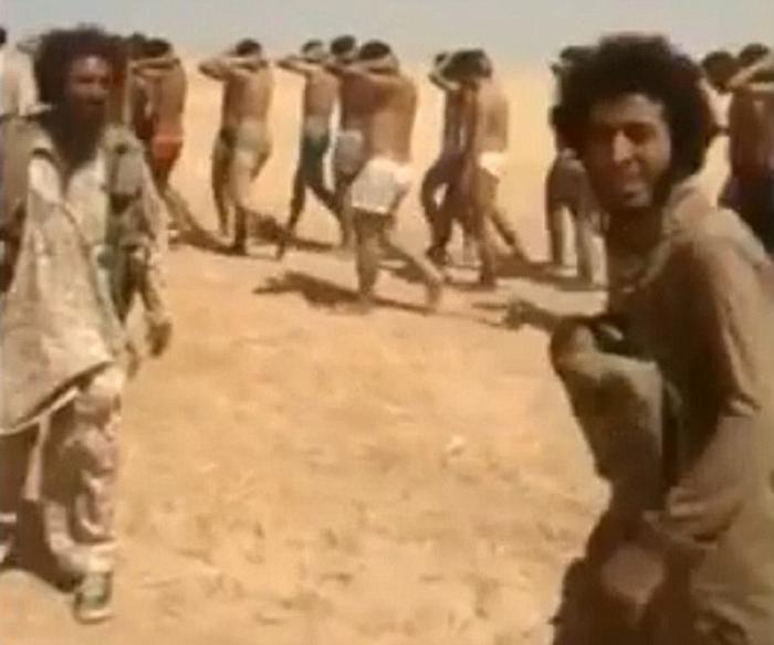 Video shows rows of bodies as 250 Syrian soldiers DEATH MARCHED, forced