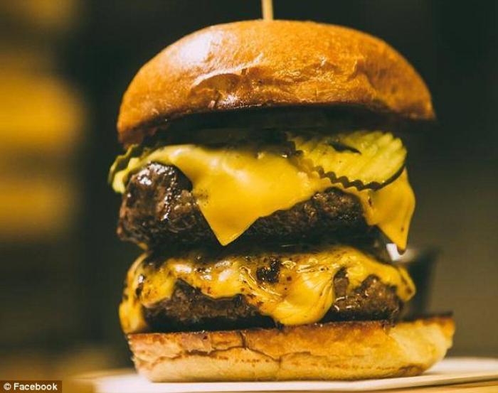 Illegal Food offers The Hank ($11), a juicy burger with American cheese, sweet onion, iceberg lettuc Illegal Food offers The Hank ($11), a juicy burger with American cheese, sweet onion, iceberg lettuc