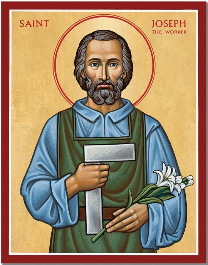 A modern depiction of St. Joseph with a modern square and lily makes it clear that St. Joseph is a worker. The earth-toned colors of his clothes depict him as an ordinary person, but the halo reveals his holiness.